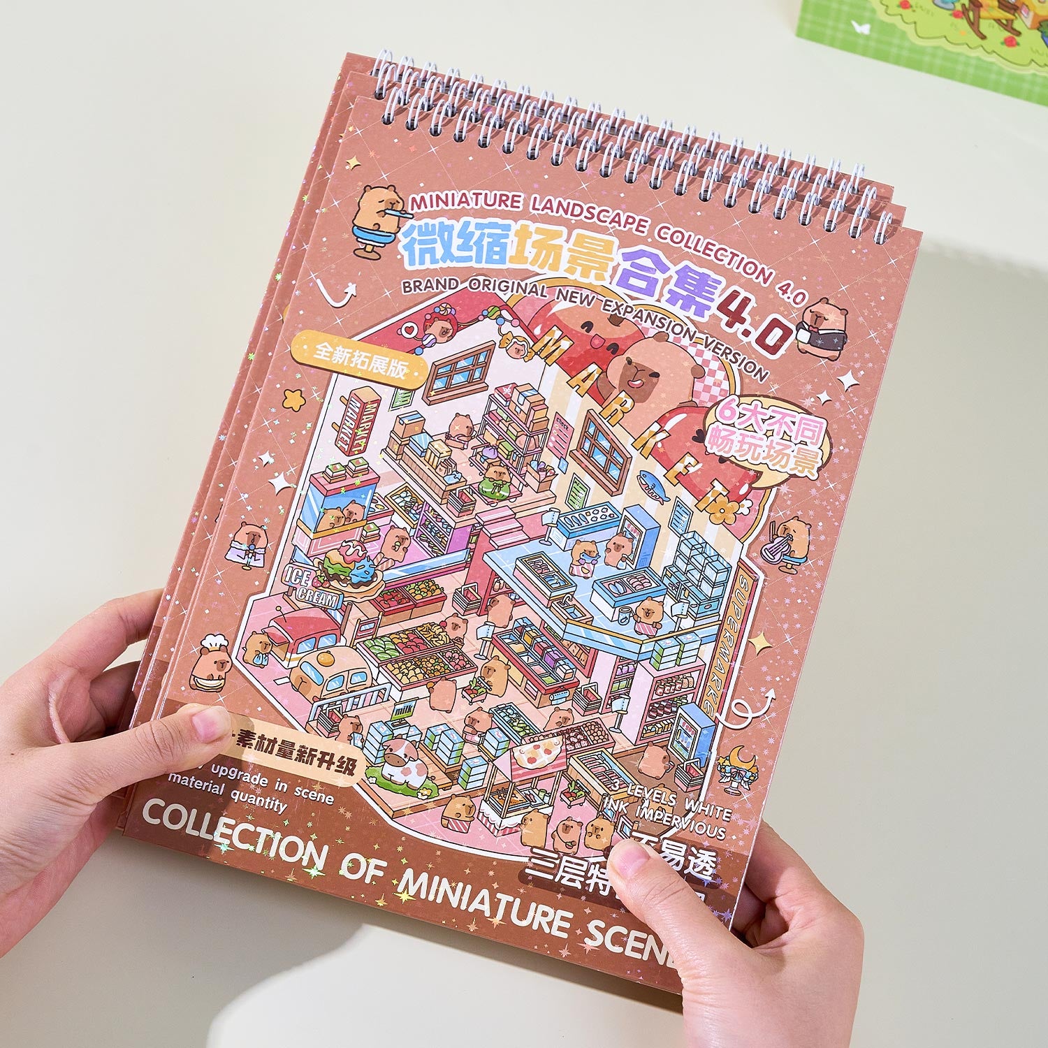 It is a Book of the reduced scene of the strange town. 6 different theme scenes. Can be used for glass metal cup body seal. 3 d Solid diy Decorative book