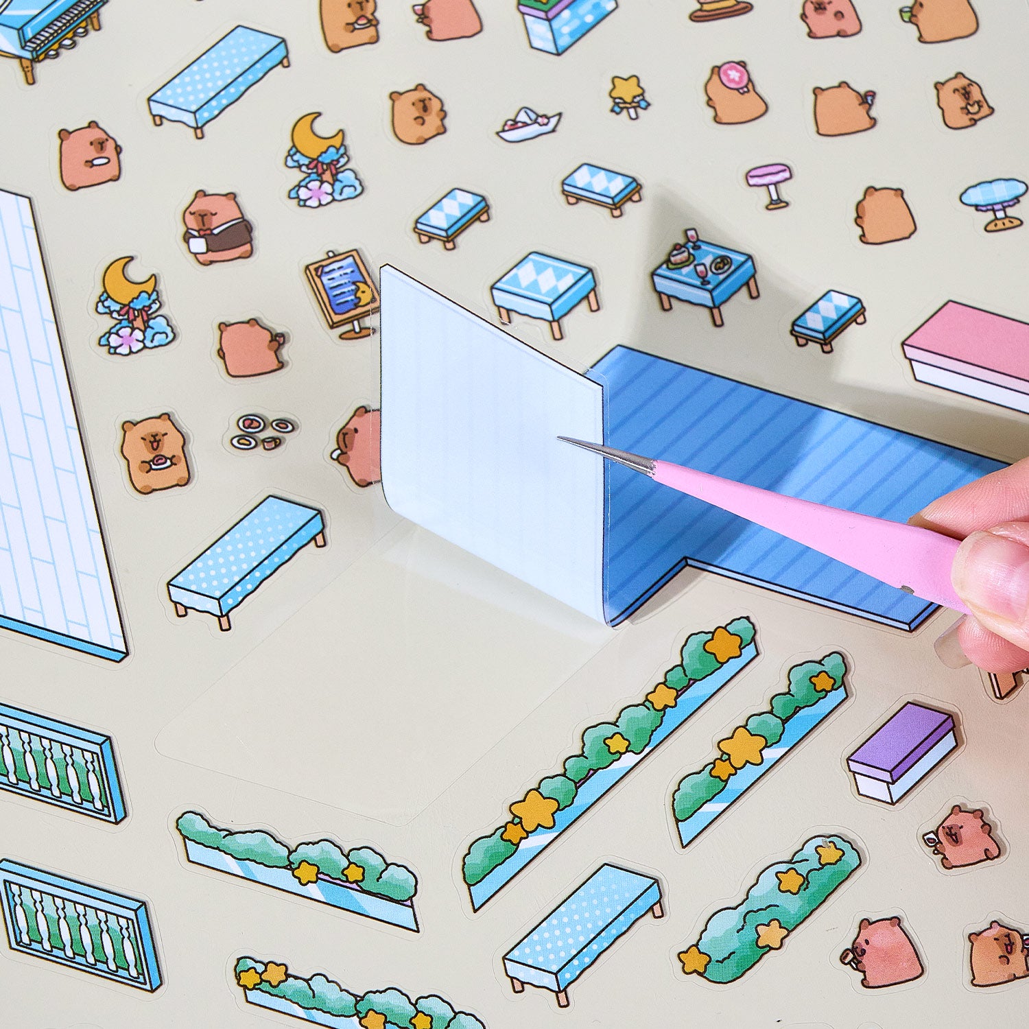 It is a Book of the reduced scene of the strange town. 6 different theme scenes. Can be used for glass metal cup body seal. 3 d Solid diy Decorative book