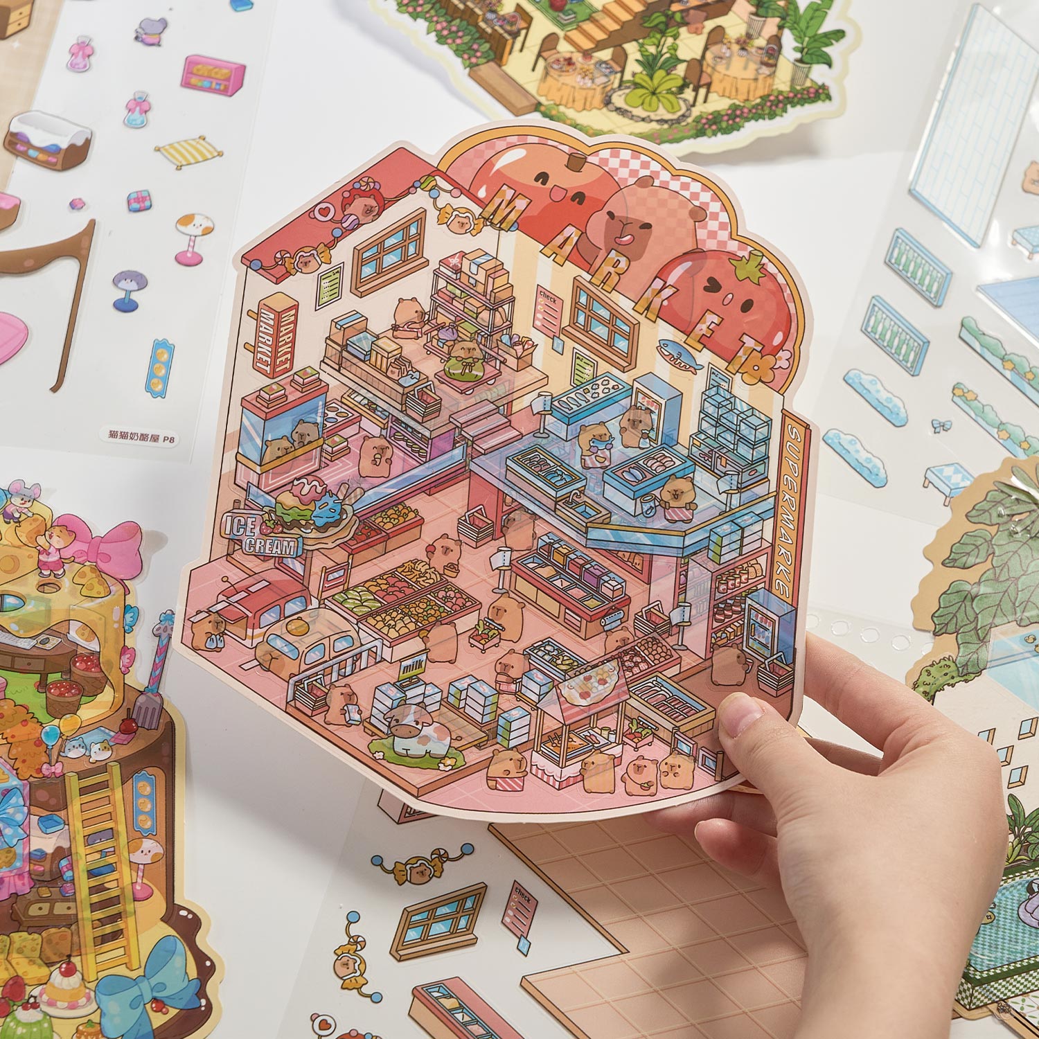 It is a Book of the reduced scene of the strange town. 6 different theme scenes. Can be used for glass metal cup body seal. 3 d Solid diy Decorative book